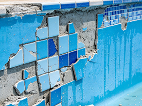 Illustration of damaged blue pool tiles